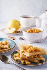 Crepes with caramelized quince and apple for dessert.