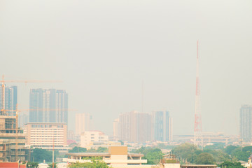 Air pollution from Lots of dust or PM2.5 particle exceeds the standard at Bangkok, Thailand. Negative effect on Respiratory system and health.