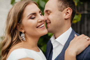 Wedding couple. Pretty bride and stylish groom.