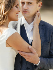 Fototapeta premium Wedding couple. Pretty bride and stylish groom.