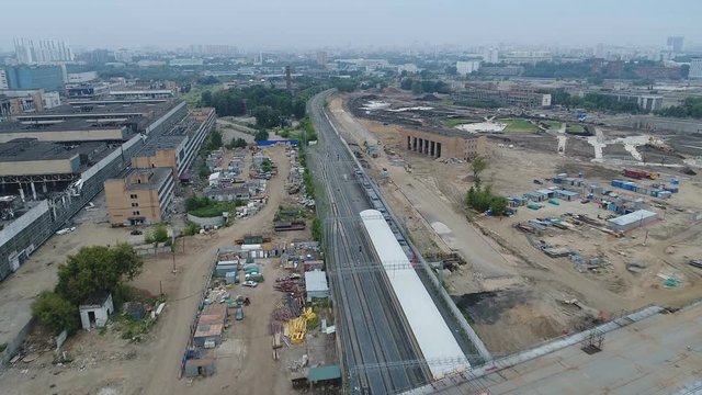 The train departs from the station ZIL Moscow Central Ring. Aerial video shooting.