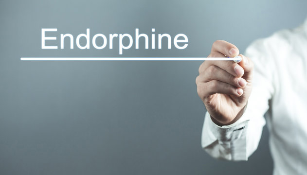 Doctor writng Endorphine text in screen.