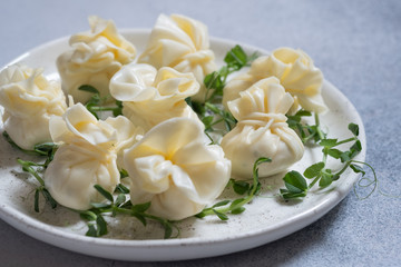Obraz na płótnie Canvas Cheese wrap stuffed with cream cheese, garlic and herbs