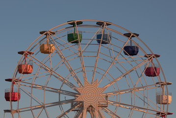 Ferris wheel on Tibidabo hill Barcelona at sunset