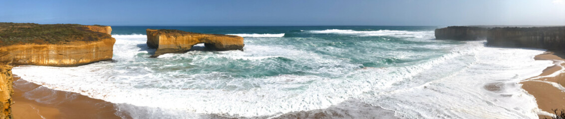 Panoramic view of London Bridge coastline and rock formations along the Great Ocean Road, Australia