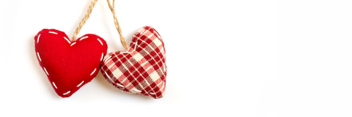 Two red fabric hearts on isolated on white panoramic background, love and valentine concept