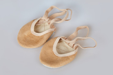 Rhythmic Gymnastics toe shoes isolated, half lyrical shoes nude colour