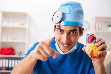 Mad doctor working in the clinic 