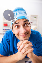 Mad doctor working in the clinic 