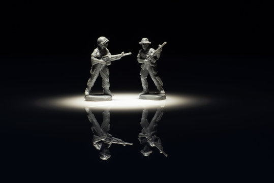 image of group of toy soldiers close up on black background