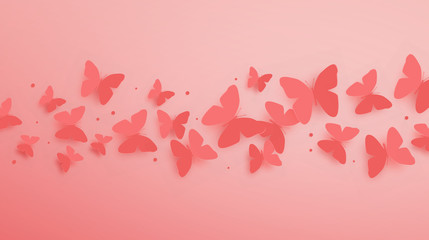 Abstract flying paper cut butterflies over pink background