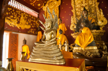 beautiful gold buddha statue of Wat Chedi Ngam in chiang mai