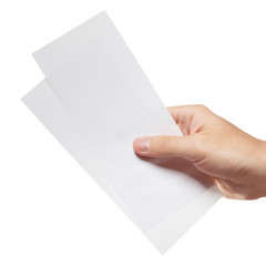 Male hand holding two blank sheets of paper (tickets, flyers, invitations, coupons, banknotes, etc.), isolated on white background