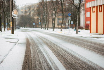 frosty winter morning, snowy empty street, winter city without people