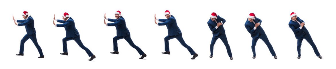 Young busnessman wearing santa hat in christmas concept on white