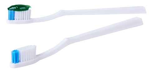 White toothbrush with green gel toothpaste isolated on white background