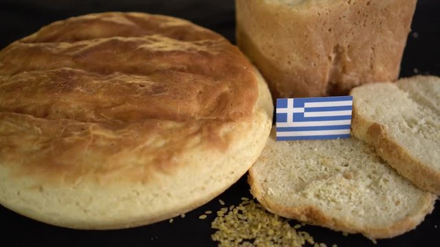 Bread with flag of Greece. World wheat import export trade