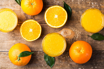 Top view of fresh orange juice with slice of fresh orange