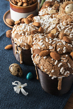 Colomba - italian easter dove cake on old rustic  board. Selective focus, free text space.
