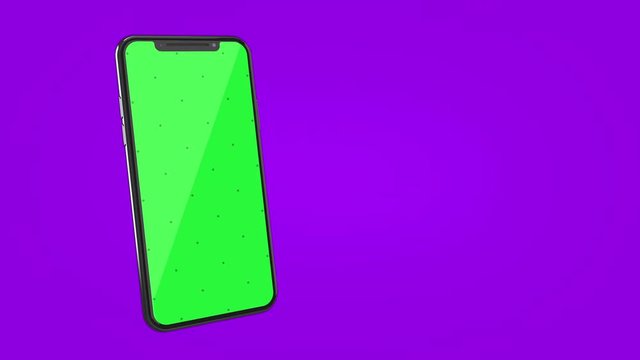 Close-up view of modern smartphone with green screen and markers on solid background, blank screen mockup with compositing masks