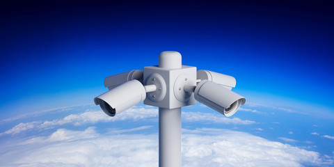 Naklejka na ściany i meble Security Cameras CCTV on pole on blue sky background. 3d illustration