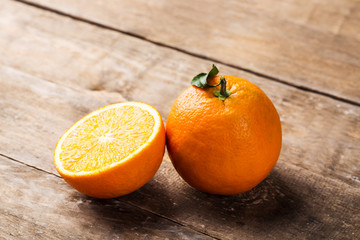 Orange fruit on wooden table. Orange fruit, healthy food.