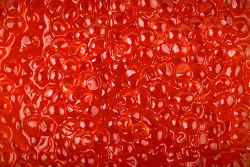 Red caviar, macro shot , focus on a center. Texture. Sea food. Healthy eating. Diet. Selective focus. Horizontal