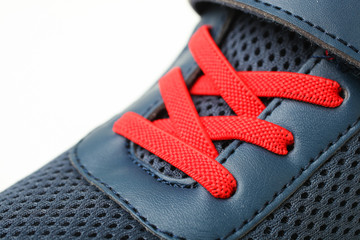 sneaker with bright red lace