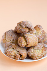Cottage cheese buns on coral color background