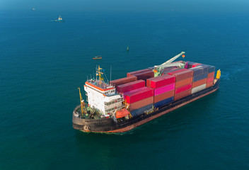 Aerial view container ship and crane for loading container, logistic business , import export, shipping or transportation.