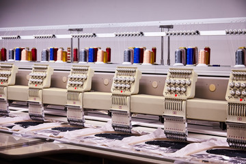 Automatic Embroidery Machines in process on the factory. 9 Needle Compact Embroidery Machine. 