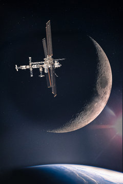 Fototapeta Collage with space station at the starry galaxy above the planet Earth and on the background of waxing crescent moon, elements of this image are furnished by NASA.