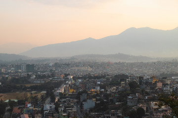 Fototapeta na wymiar Sunset view of Kathmandu city with mountain on the background.