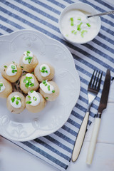 Potato dumplings with sour cream