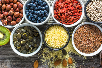 Healthy food, top view. Bowls with fresh ingredients for breakfast on table. Vegan diet concept.