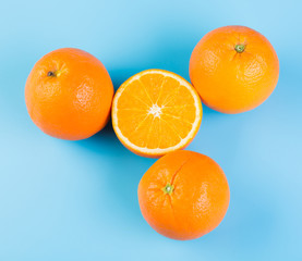 Orange fruit on blue background