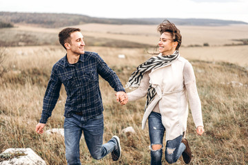 Romantic young couple enjoy spending time together outdoor.