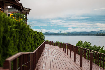 Beautiful scenic view of Mekong river and Chiangkhan village in cloudy day  in Chiangkhan district , Loei province  ,Thailand. selective focus.