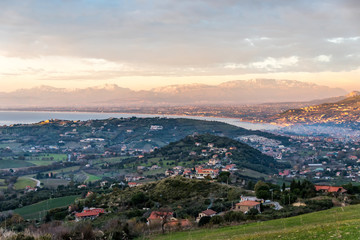 View of the Hills, Village and Distant Mountains along the Southern Italian Mediterranean Coast
