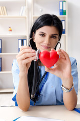 Female doctor cardiologist working in the clinic