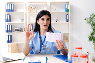 Female doctor cardiologist working in the clinic