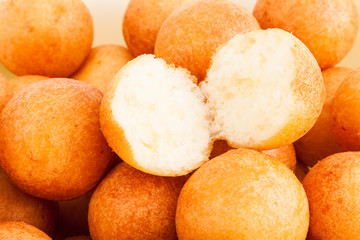Traditional Colombian buuelo - Deep Fried Cheese Bread on white background