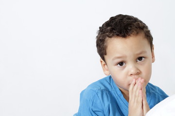 little boy praying