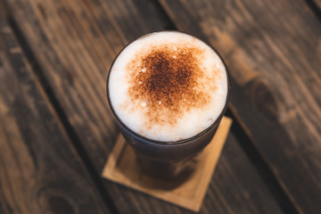 Chocolate smoothie, Cocoa drink, chocolate cocktail. On a wooden background.