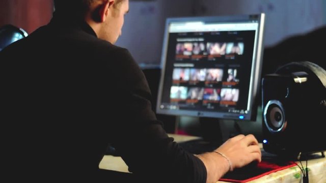 people surfing to watch a pornographic site on the Internet looking for virtual sex, the screen is out of focus,