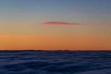 Fototapeta na wymiar Dawn on the Mount Grappa in Italy. View from the summit