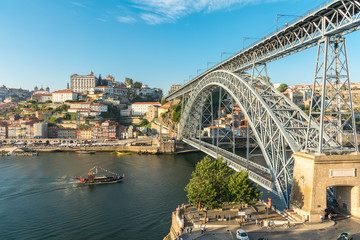 The Dom Luis I Bridge is a famous double-decker metal arch bridge that spans the Douro River between the cities of Porto and Vila Nova de Gaia in Portugal.	