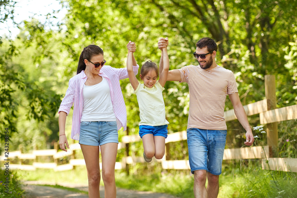 Poster family, leisure and people concept - happy mother, father and little daughter walking in summer park