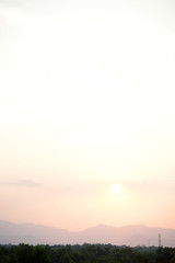 sunset in mountains view landscape beautiful with fog and forest