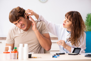 Patient with hearing problem visiting doctor otorhinolaryngologi